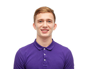 Image showing smiling young man in purple polo t-shirt