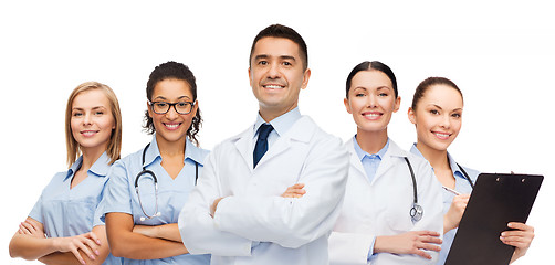 Image showing group of smiling doctors with clipboard