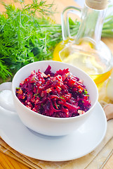 Image showing Fresh salad with beet and walnuts, vegetarian salad