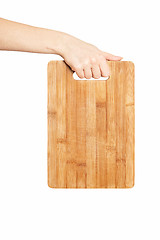 Image showing hand holding chopping board