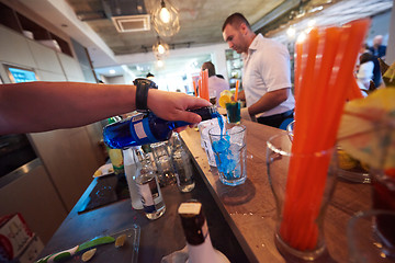 Image showing barman prepare fresh coctail drink