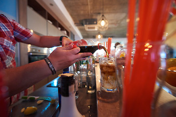 Image showing barman prepare fresh coctail drink