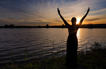 Image showing Rejoice Life - woman  against sunset sky