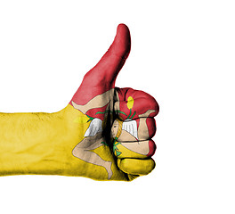 Image showing Closeup of male hand showing thumbs up sign