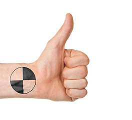 Image showing Closeup of male hand showing thumbs up sign