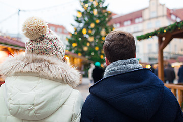 Image showing close up of couple in old town at christmas