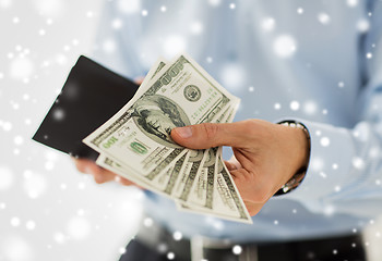 Image showing close up of businessman hands holding money