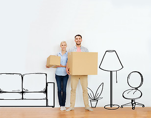 Image showing couple with cardboard boxes moving to new home