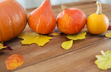 Image showing close up of pumpkins on wooden table at home