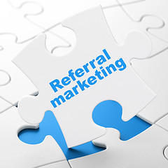 Image showing Advertising concept: Referral Marketing on puzzle background