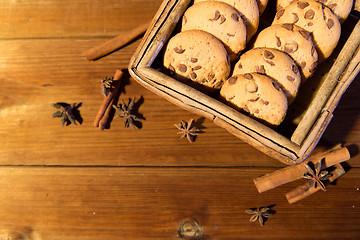 Image showing close up of oat cookies on wooden table