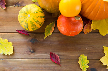 Image showing close up of pumpkins on wooden table at home