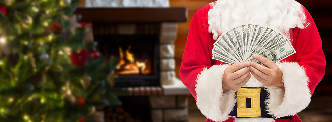 Image showing close up of santa claus with dollar money