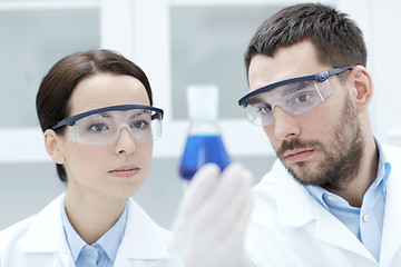 Image showing young scientists making test or research in lab