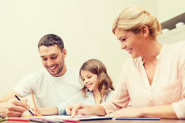 Image showing happy family drawing at home