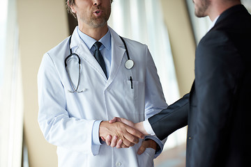 Image showing doctor handshake with a patient