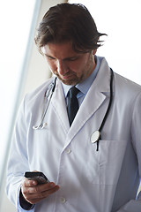 Image showing doctor speaking on cellphone