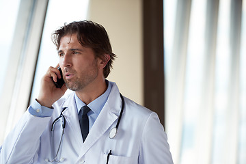 Image showing doctor speaking on cellphone