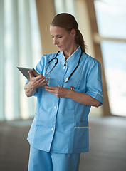 Image showing female doctor with tablet computer