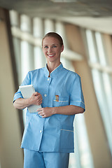 Image showing female doctor with tablet computer