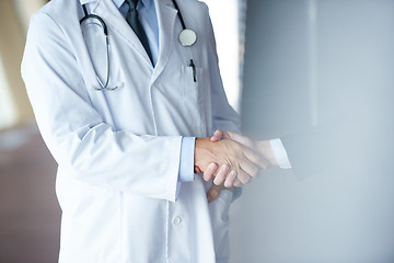 Image showing doctor handshake with a patient