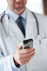 Image showing doctor speaking on cellphone