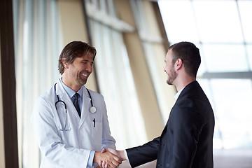 Image showing doctor handshake with a patient