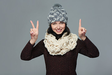 Image showing Woman giving peace sign