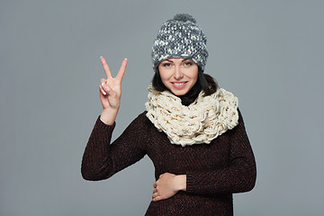 Image showing Woman giving peace sign