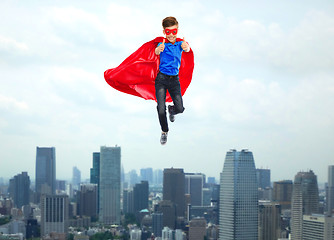 Image showing boy in super hero cape and mask showing thumbs up