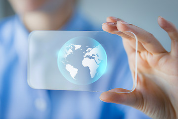 Image showing close up of woman with transparent smartphone