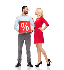 Image showing happy couple with red sale sign