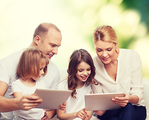 Image showing happy family with tablet pc computers