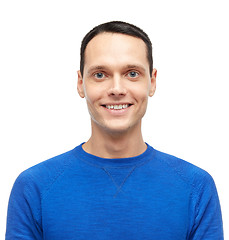 Image showing smiling young man in blue pullover portrait