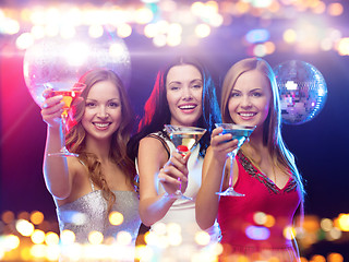 Image showing smiling women with cocktails at night club