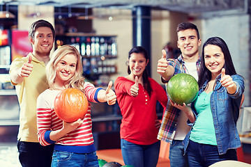 Image showing happy friends in bowling club