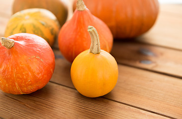 Image showing close up of pumpkins on wooden table at home