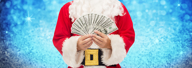 Image showing close up of santa claus with dollar money