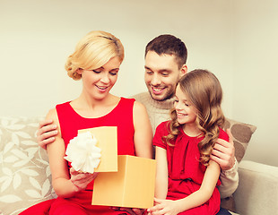 Image showing happy family opening gift box