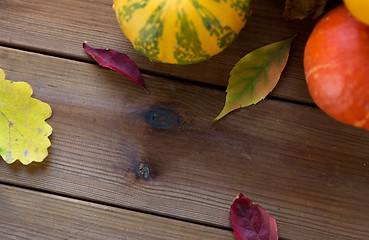 Image showing close up of pumpkins on wooden table at home