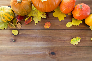 Image showing close up of pumpkins on wooden table at home