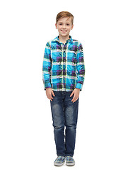 Image showing smiling boy in checkered shirt and jeans