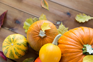 Image showing close up of pumpkins on wooden table at home