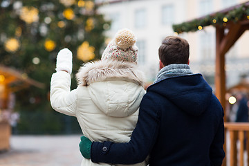 Image showing close up of couple in old town at christmas