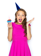 Image showing happy woman or teen girl with birthday cupcake