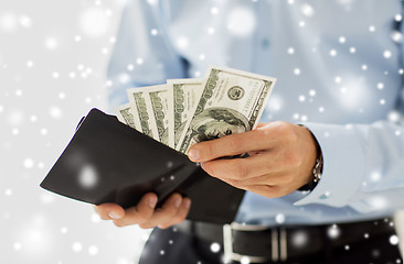 Image showing close up of businessman hands holding money