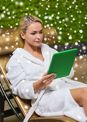 Image showing beautiful young woman with  tablet pc at spa