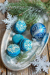 Image showing Macarons and Christmas ball. Christmas composition.