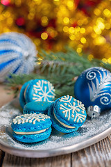 Image showing Blue macarons with Christmas decor.