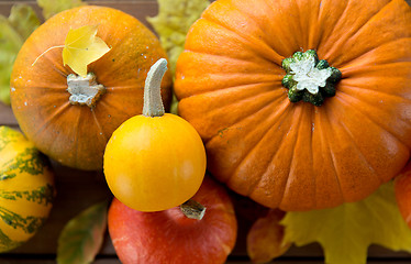 Image showing close up of pumpkins on wooden table at home